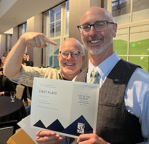 Jason Salzman and Ari Armstrong celebrate the Top of the Rockies Excellence in Journalism Awards win.