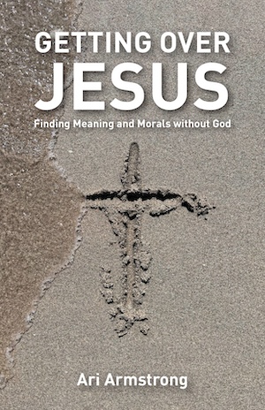 Cover of Getting Over Jesus showing a cross in beach sand