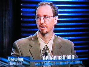 Ari Armstrong on the set with Reggie Rivers