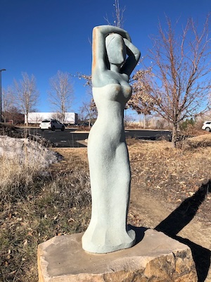 'Village Beauty' by Gregory Mutasa, displayed at a sculpture garden in Loveland.