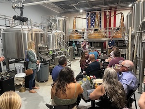 Photo of 2023 Denver YIMBY event at a distillery.